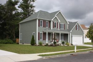 exterior of large family home with new lap siding